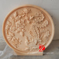 small stone round relief sculpture